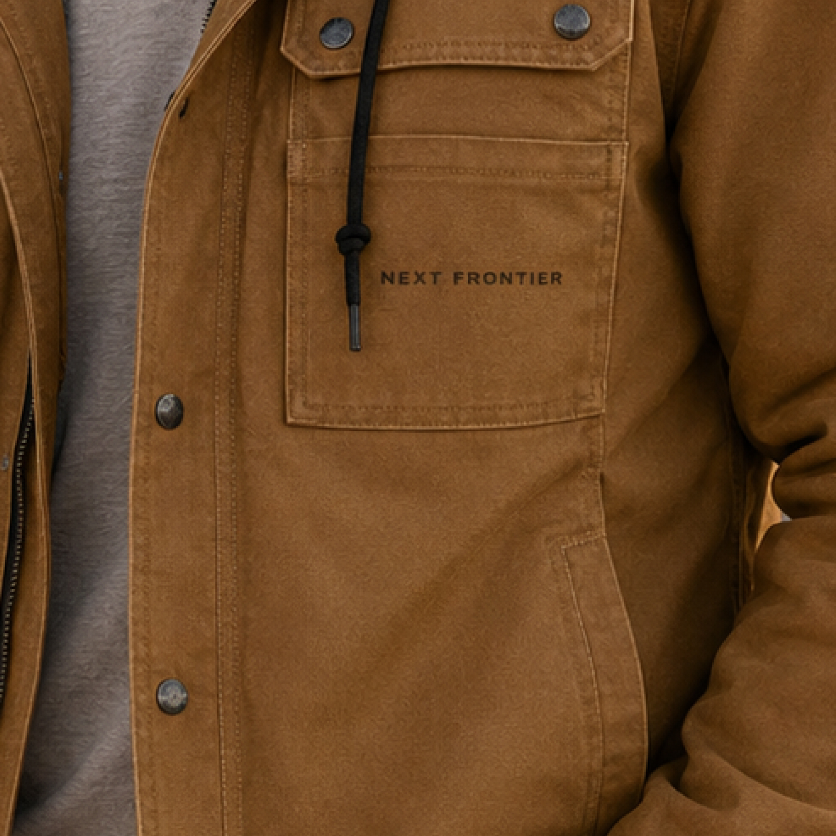 Work shirt embroidered with the Next Frontier Capital wordmark